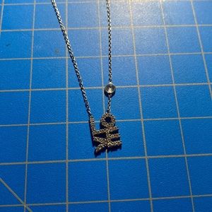 Silver sparkly small love necklace
